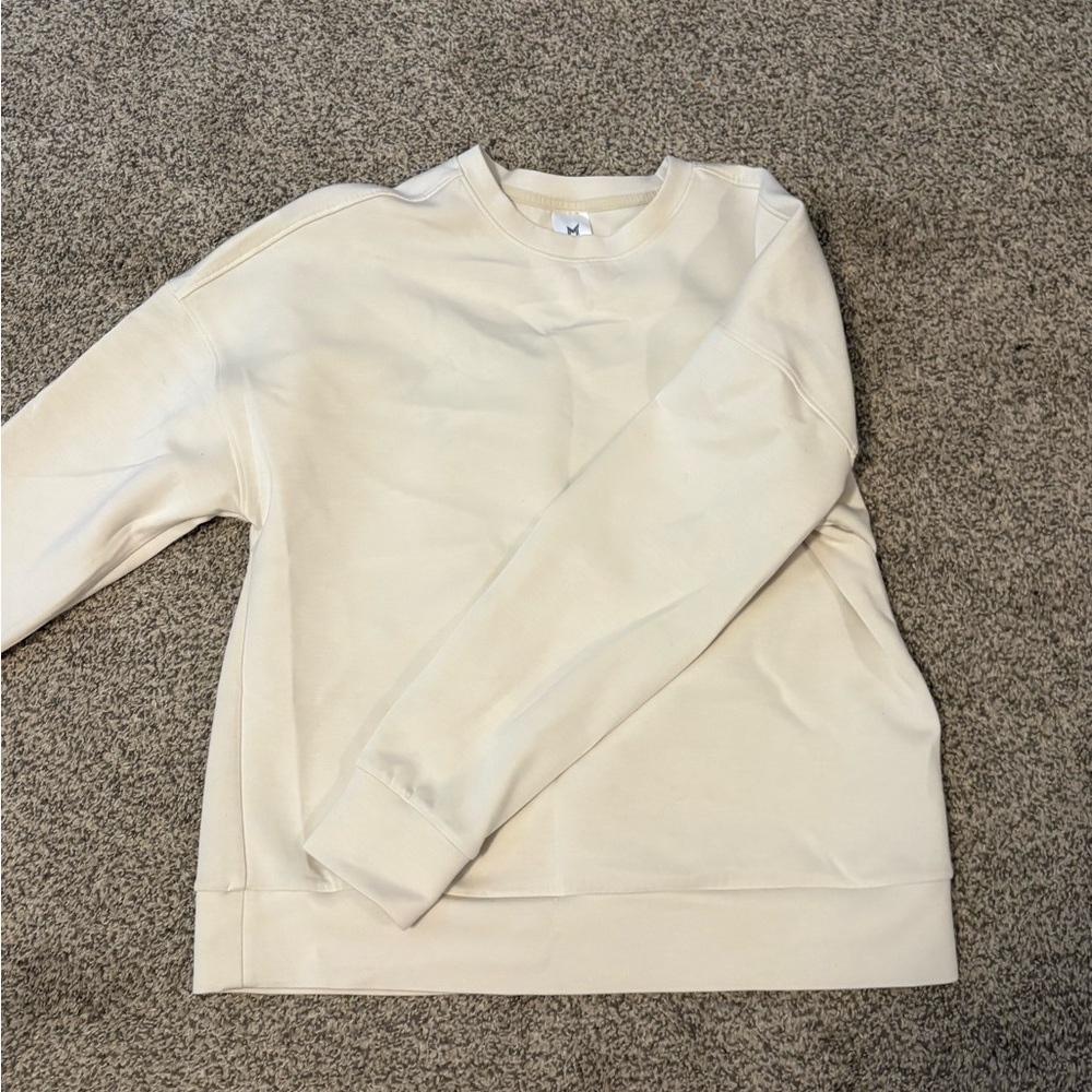 Cream crewneck sweatshirt
